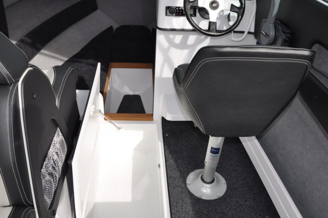 Storage abounds with large side pockets, under seat storage and floor locker | REDHOT Marine