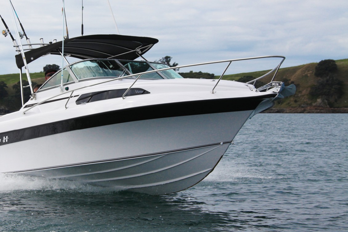 725 options include enclosed head, freezer, shower, 2-burner gas stove and full length V-berth | REDHOT Marine
